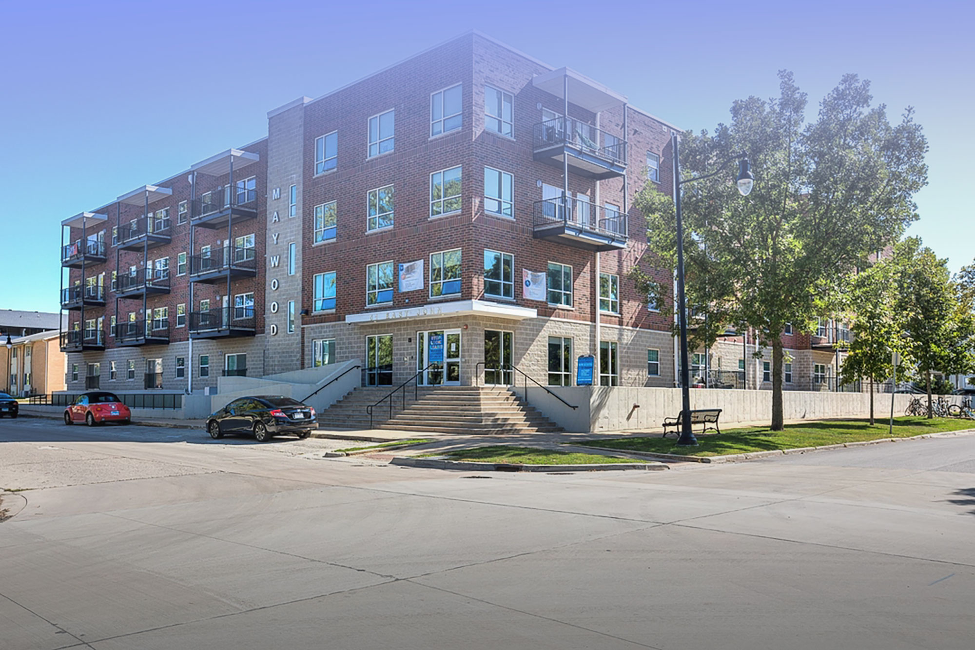 Exterior photo of the Maywood Apartments building